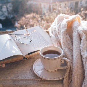 Reading for blogging ideas with hot tea