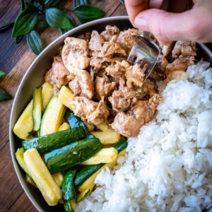 Chinese Five Spice chicken with crisp zucchini spears and fluffy rice