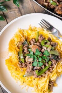 Baked spaghetti squash with beef and veggies close-up photo