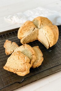 A loaf and slices of Gluten Free Irish Soda Bread made with 1 to 1 flour