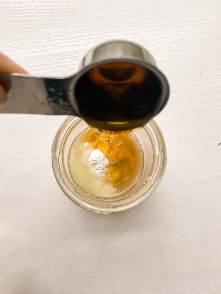 Honey Lemon Glaze mixed in a jar.