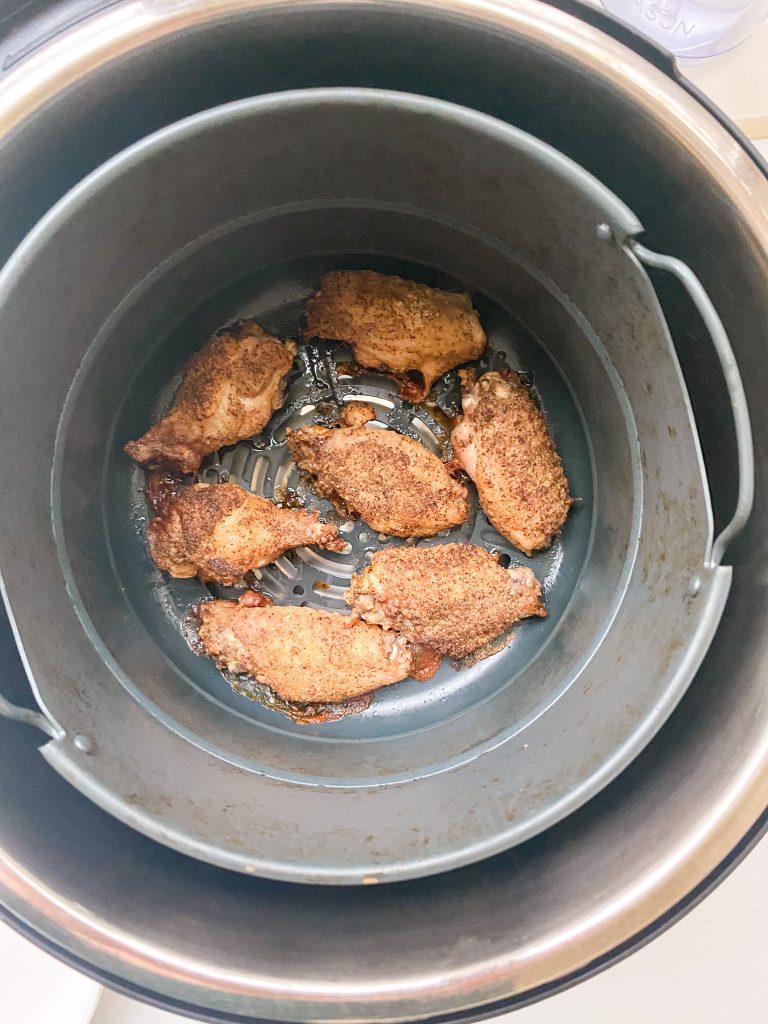 Lemon Pepper wings crispy and finished in the air fryer basket.