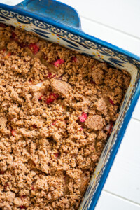 An overhead view of the gluten free rhubarb cake to show the crisp streusel topping.