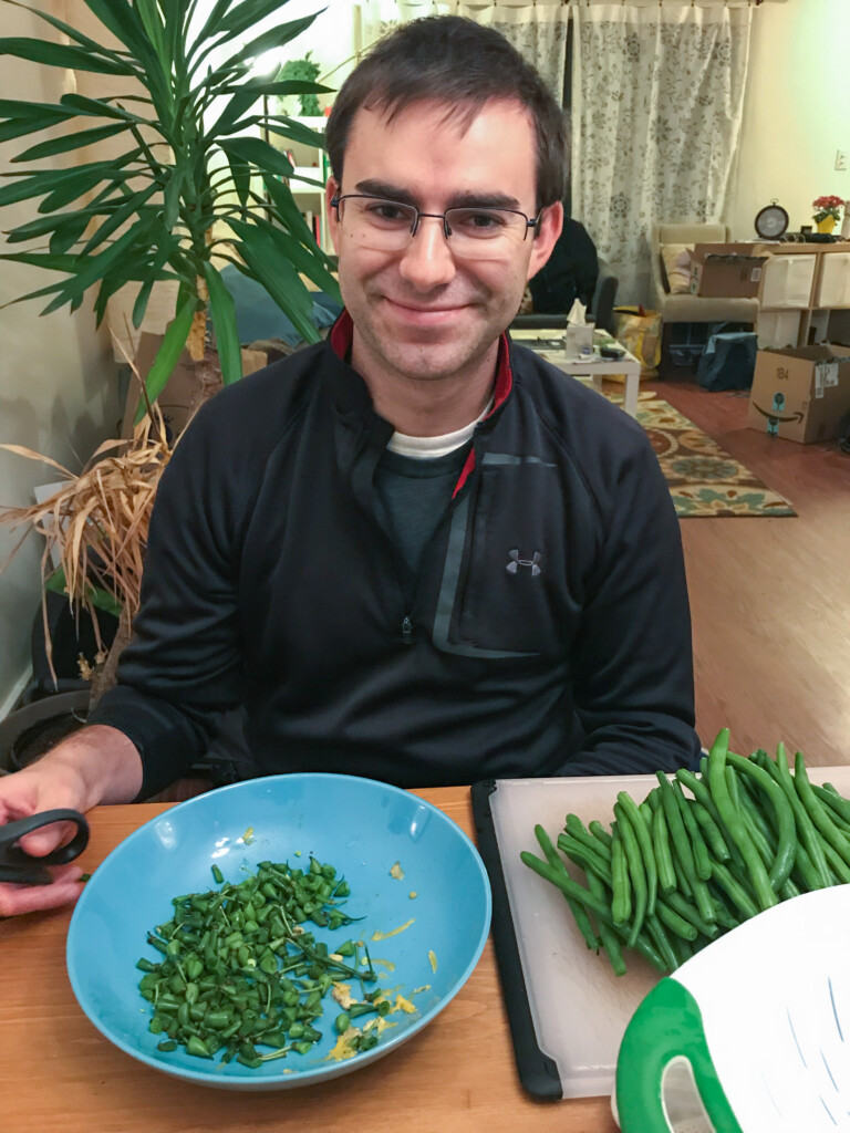 Kevin trimming green beans for Thanksgiving.