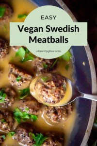 Overhead view of vegan swedish meatballs in a skillet with a close up of one on a spoon to show the outer texture with quinoa and bits of mushrooms.
