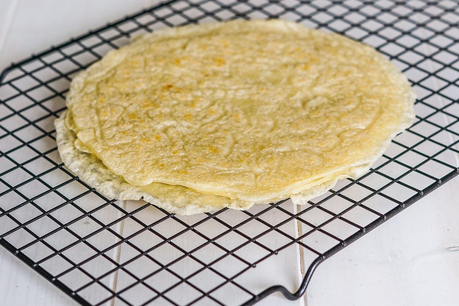 Side view of Tapioca Flour Crepes stacked on a cooling rack
