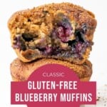 Side view of the inside of a gluten-free blueberry muffin to show the fluffy texture and tons of juicy blueberries!