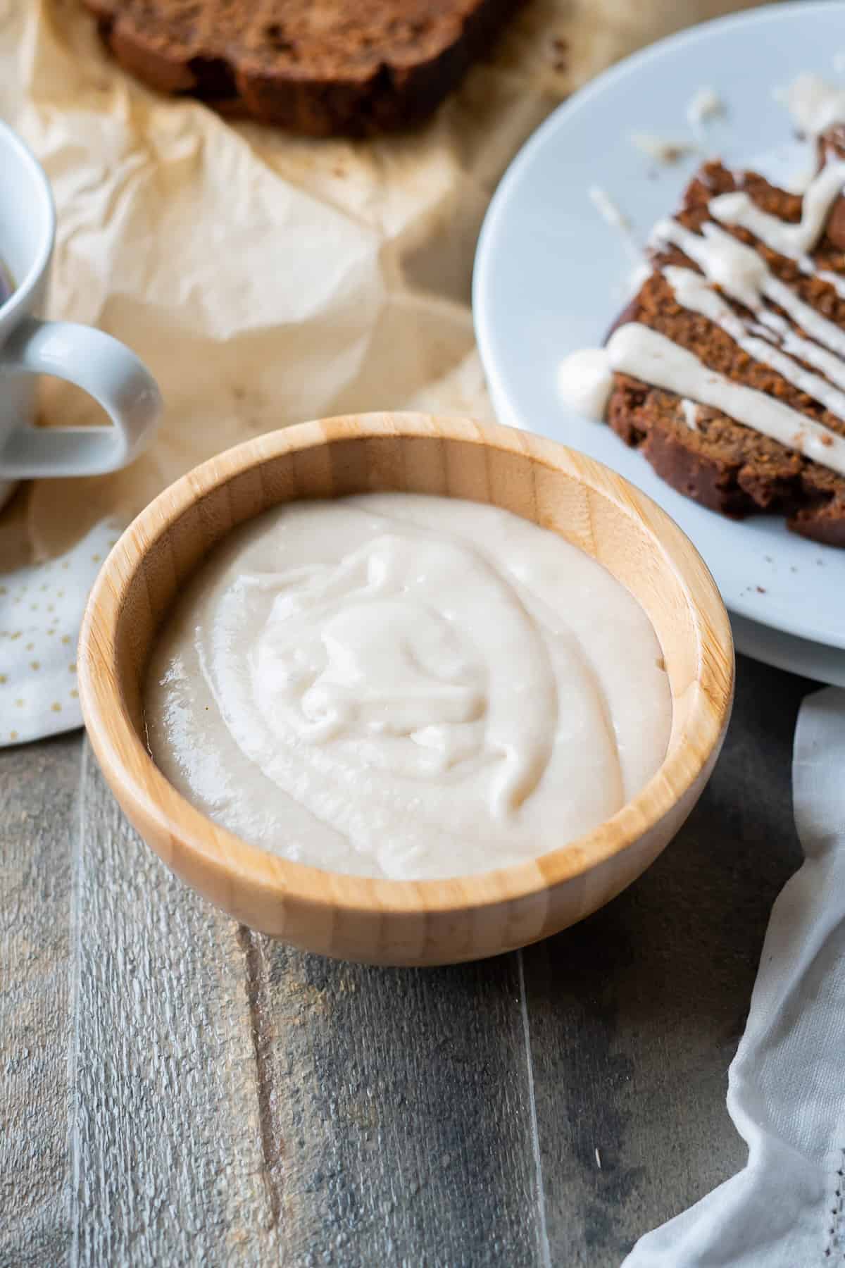 A bowl of the best icing for gingerbread cake.