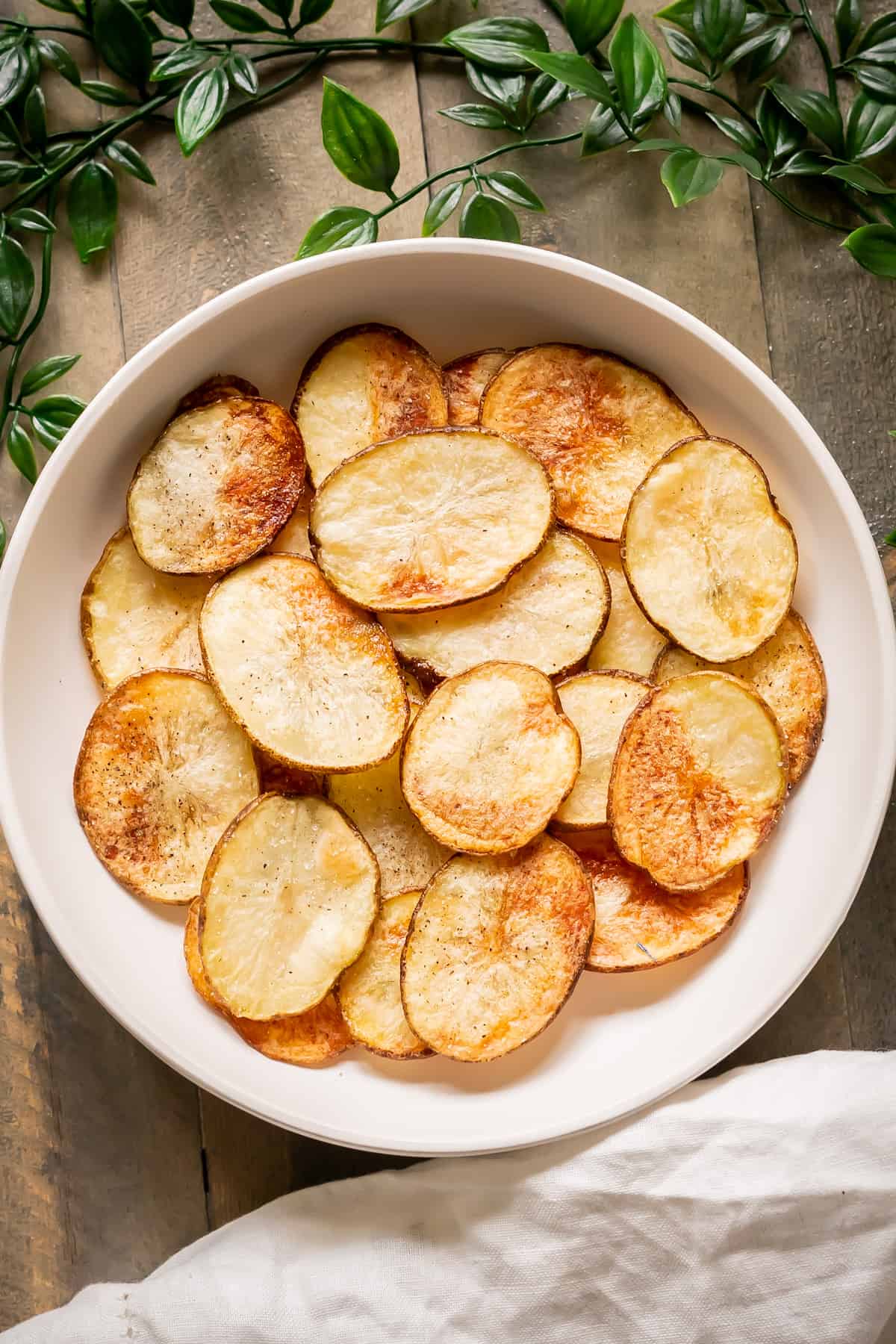 A serving bowl of freshly baked cottage fries.