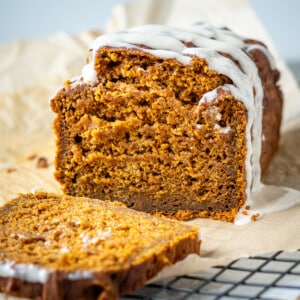 The inside of a loaf of gluten free pumpkin bread to show its soft and fluffy texture.
