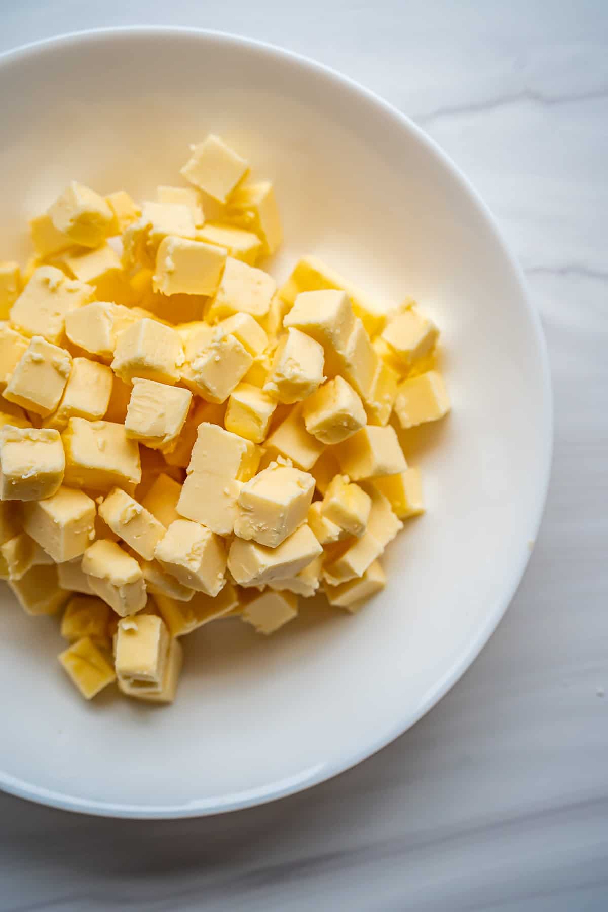 A bowl of cold cubed butter.