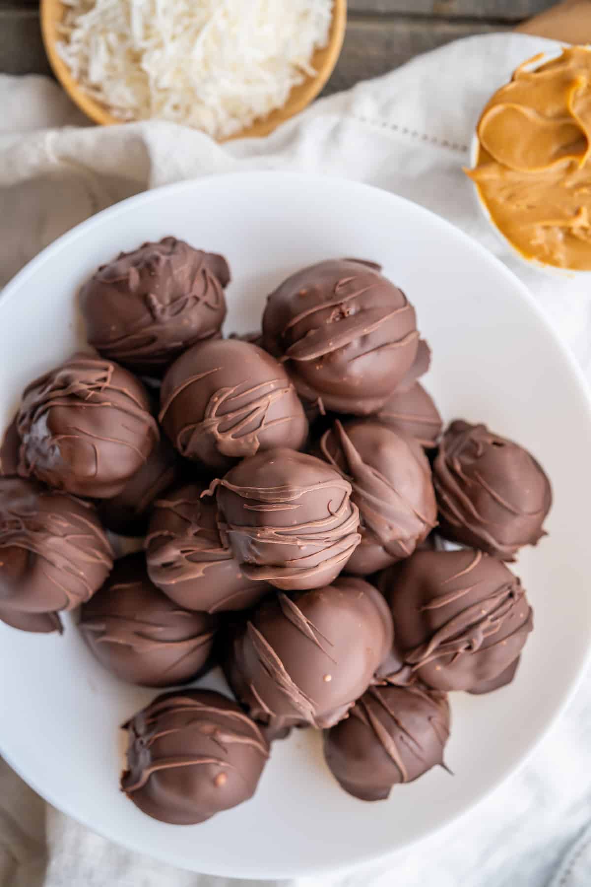 A bowl of healthy chocolate peanut butter balls.