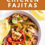 A healthy baked chicken fajitas served in a bowl over rice.