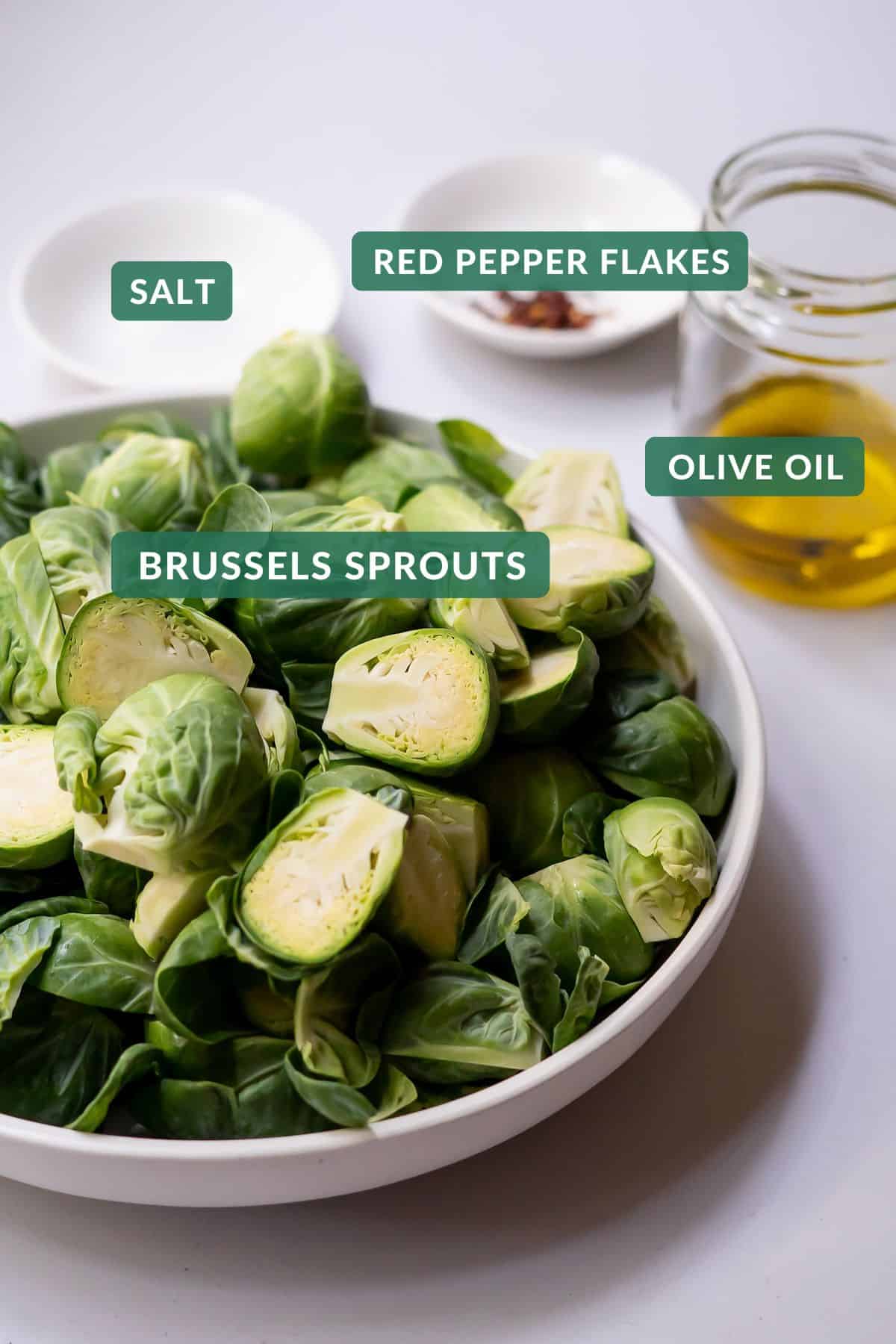 The four simple ingredients needed to make crispy roasted brussels sprouts.