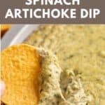 A chip dipped into creamy and chunky dairy-free spinach artichoke dip.