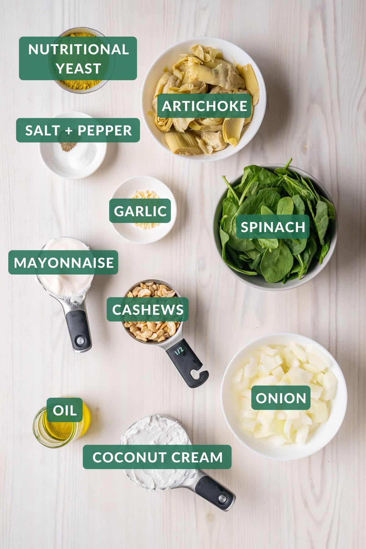The ingredients needed to make dairy-free spinach artichoke dip.