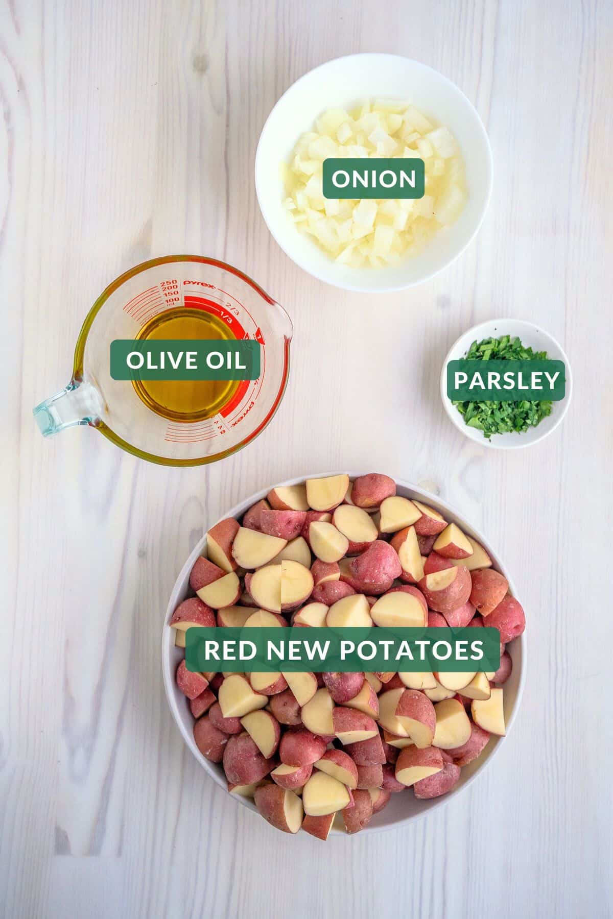 The three ingredients needed to make roasted parsley red potatoes.