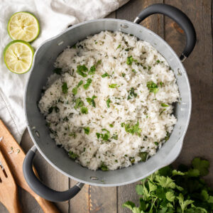 A pot of fluffy copycat chipotle cilantro lime rice.