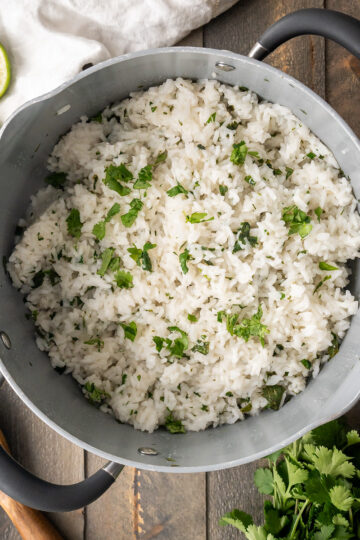 A pot of fluffy copycat chipotle cilantro lime rice.