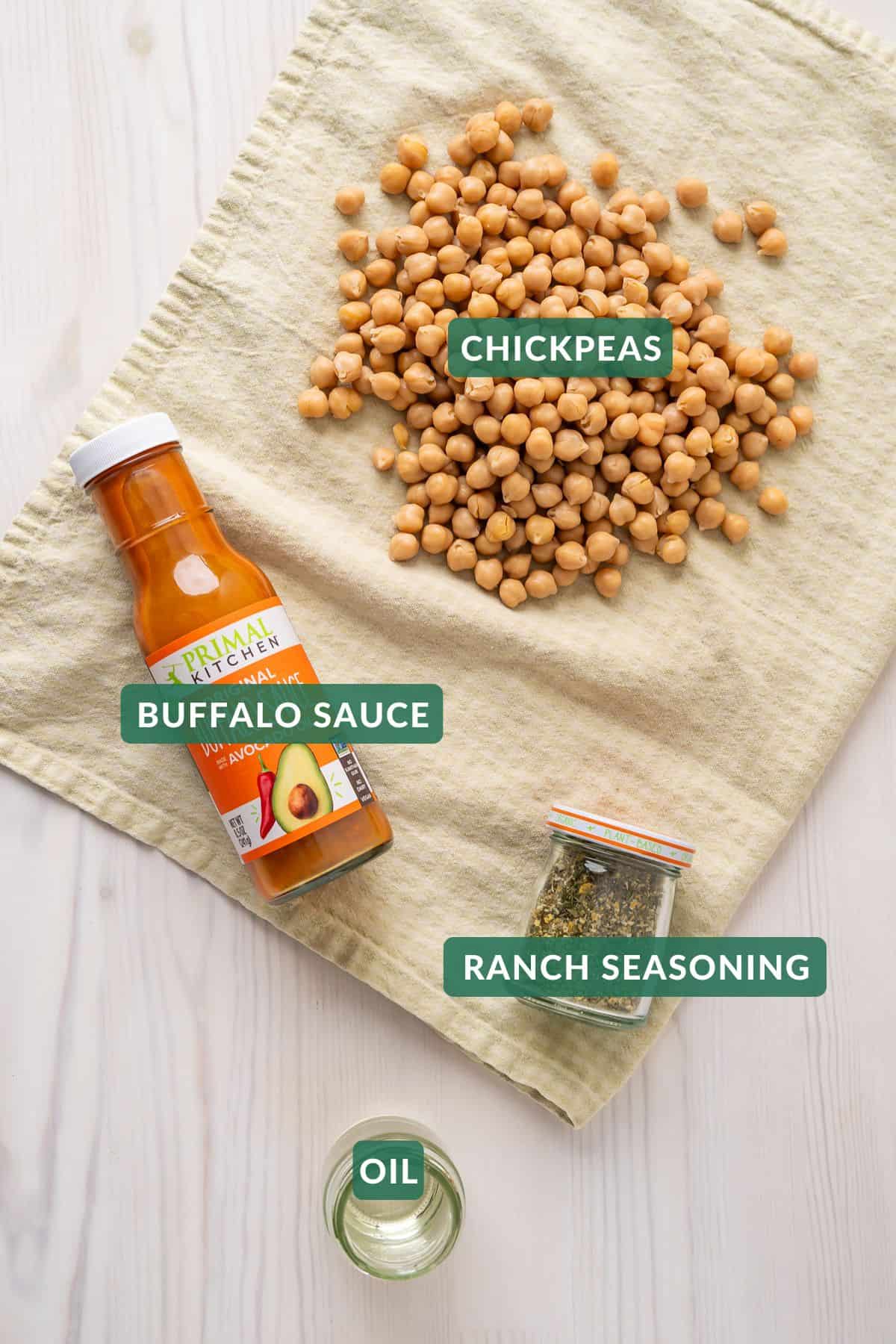 The four ingredients needed to make crispy roasted buffalo chickpeas.