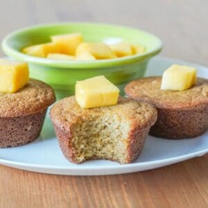 The inside of a mango muffin to show the soft and moist texture.