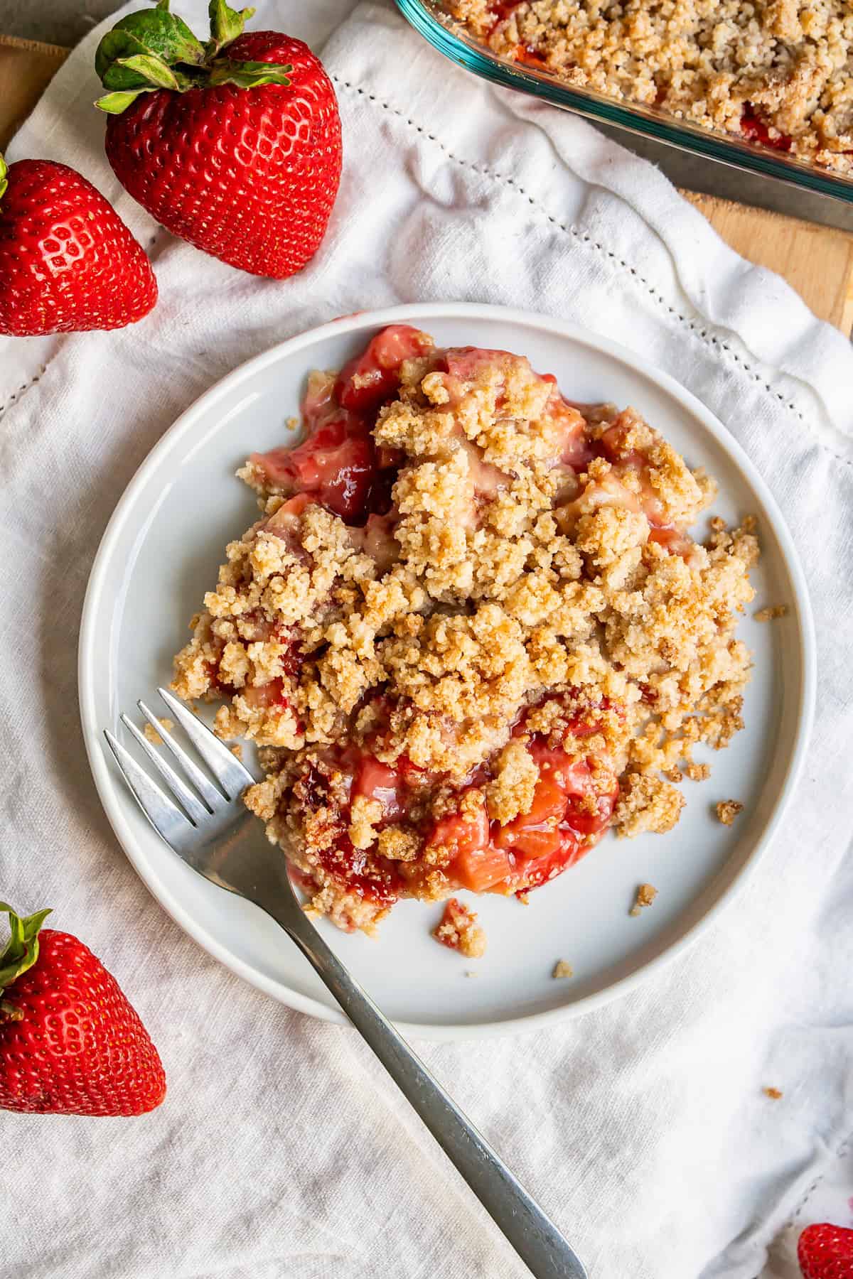 A serving of strawberry rhubarb crumble ready to eat!