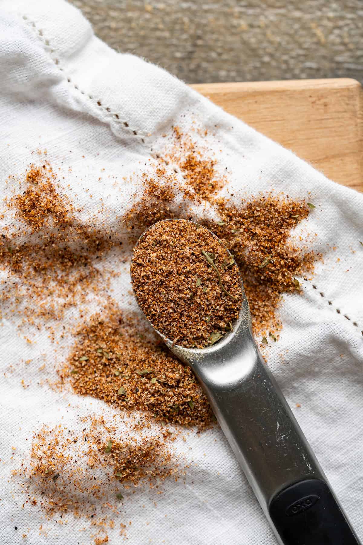 A close up of homemade taco meat seasoning to show the different spices and textures.