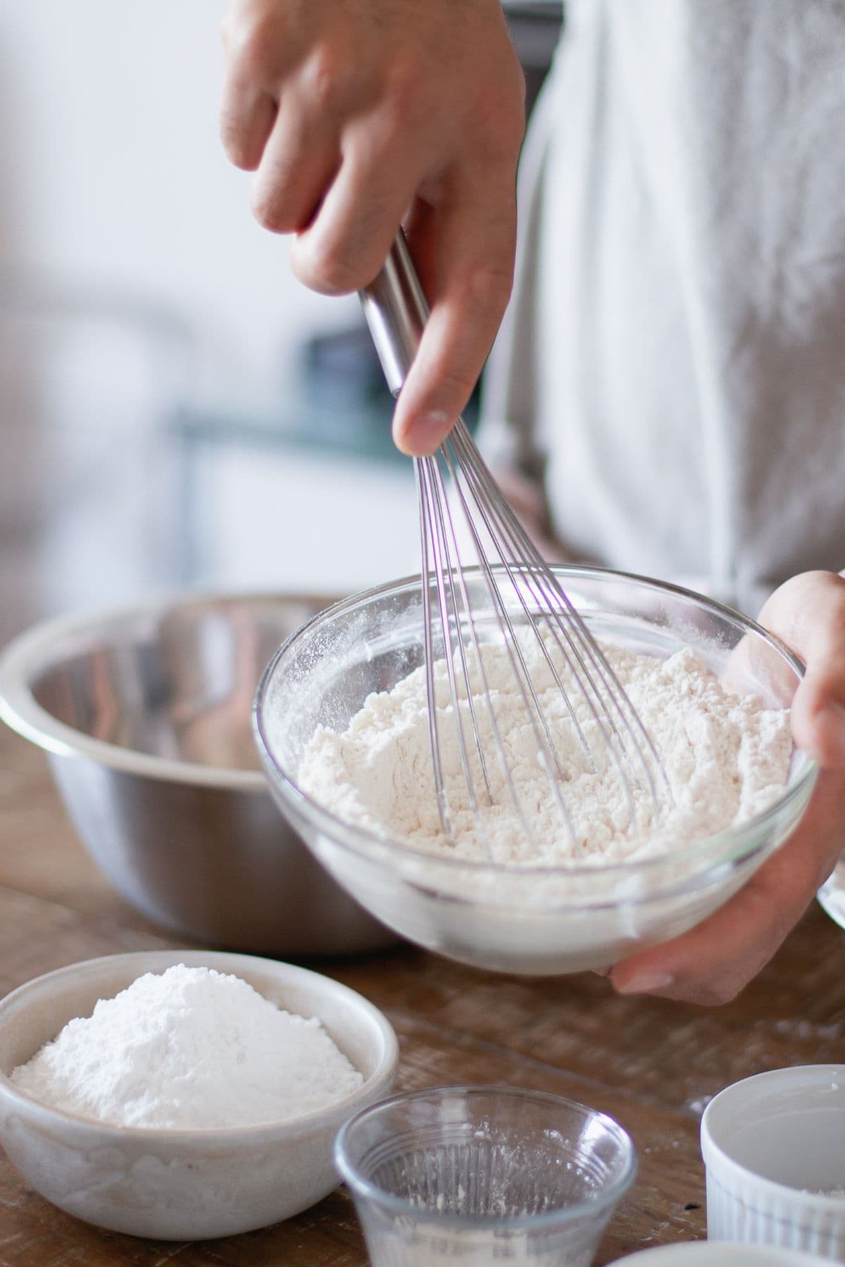 Whisking flour while baking.
