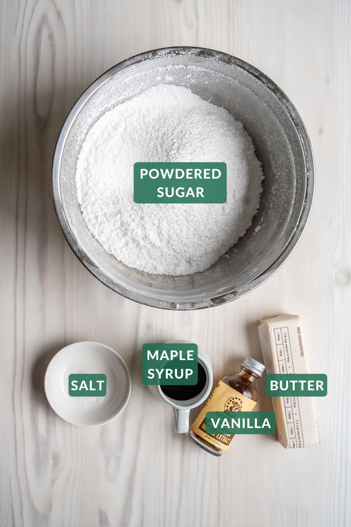 The five ingredients needed to make maple buttercream frosting.