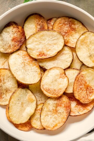 A serving bowl of freshly baked cottage fries.