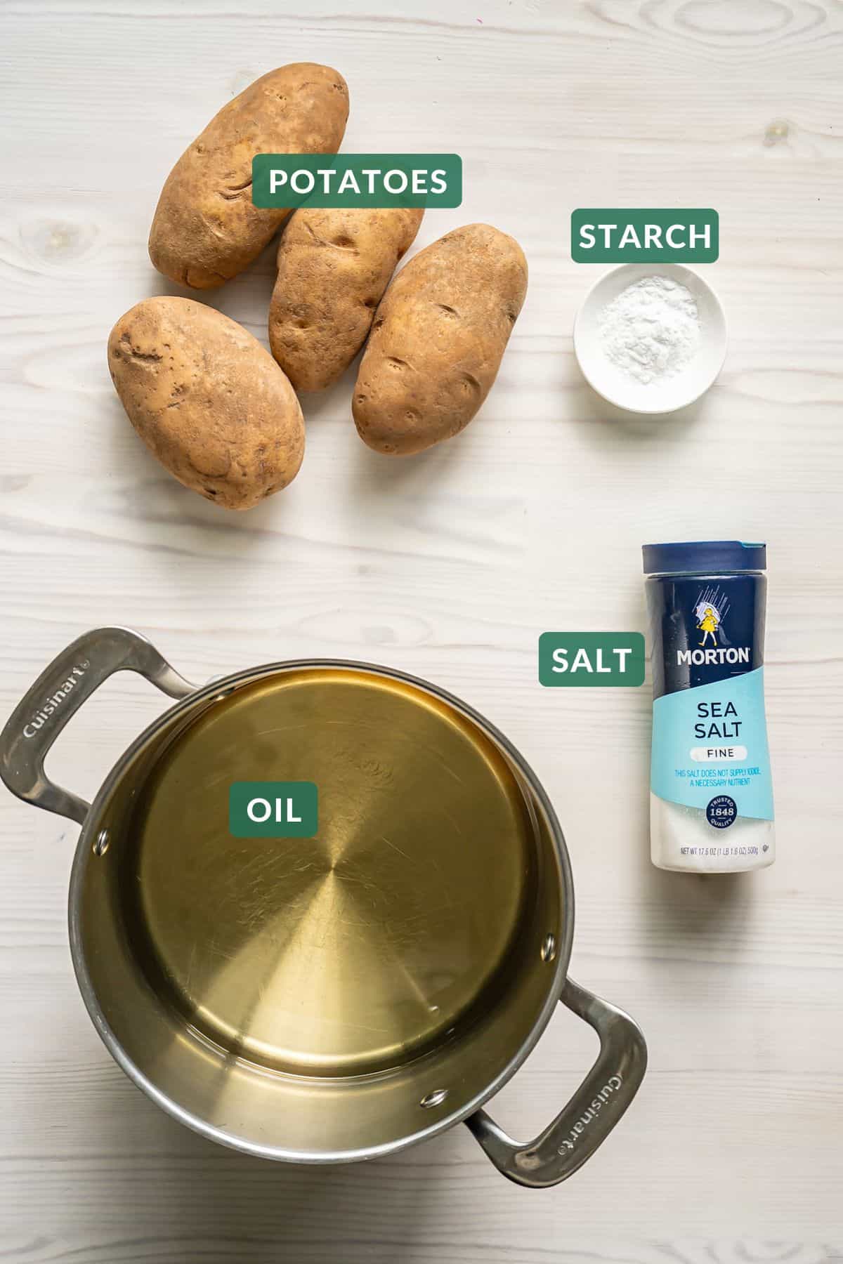 The simple ingredients needed to make crispy homemade french fries: potatoes, starch, oil, and salt.