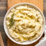 A serving dish of creamy dairy-free mashed potatoes with coconut milk.